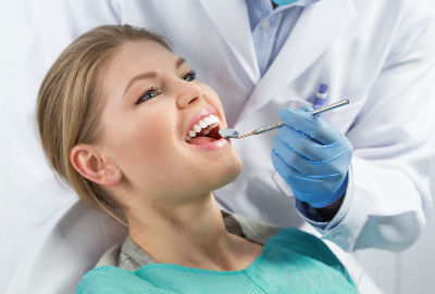 осмотр у стоматолога